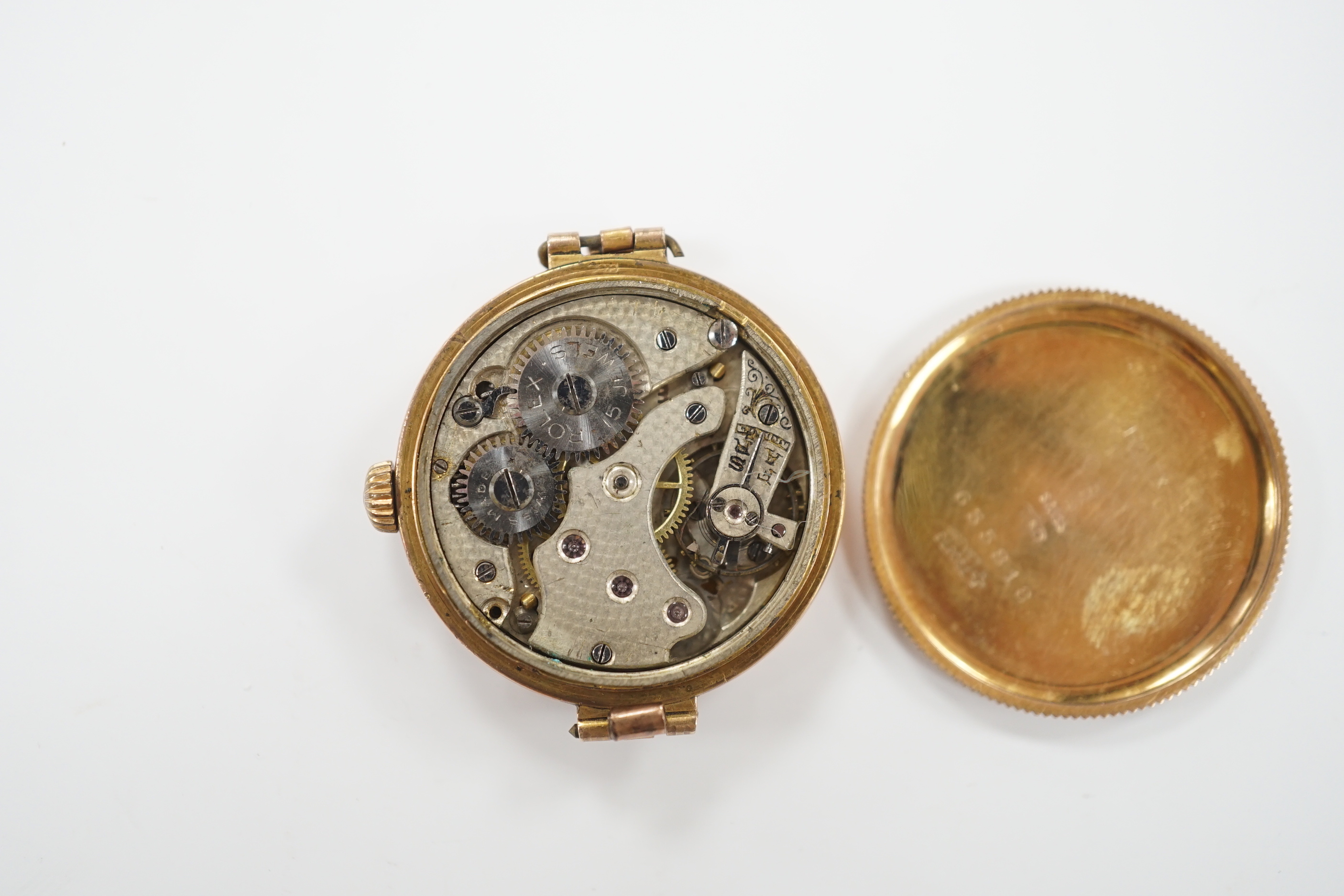 An early 20th century 9ct gold Rolex manual wind wrist watch, with detached associated flexible strap (a.f.).